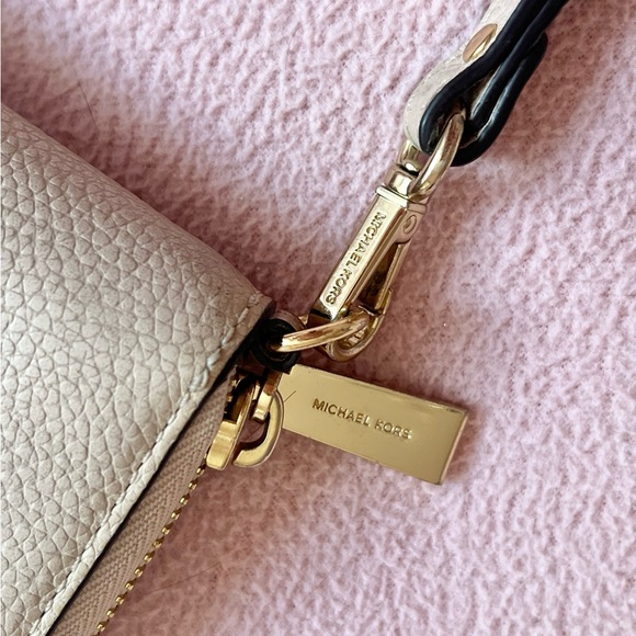 beige Michael Kors wallet with hand strap - Picture 2 of 2